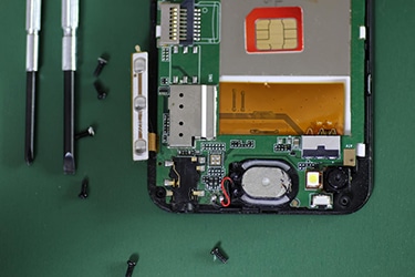 the motherboard and components of a cell phone
