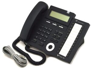an old style phone with a cord attached to it